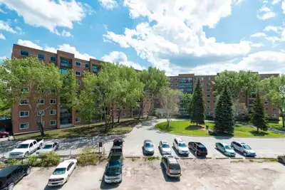 Generous living spaces, distinctive features, and exceptional amenities come together at 1310 Archib...