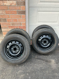 Winter tires on rims. 215/60R16