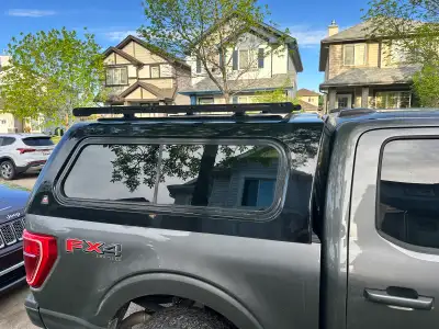 13th GEN F150 LEER canopy. Currently on a 2022 F150 5’5” box. Fits a little short but good fit. Came...