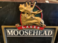 Moose head beer chalk board. 