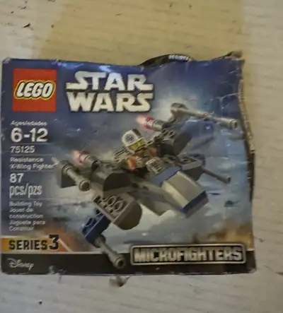 Build your own miniature Resistance X-Wing Fighter with this new in sealed box Lego Star Wars set (7...