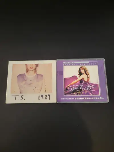 Two Taylor Swift albums, 1989 is complete in great condition.*Please note speak now only comes with...