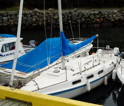 We are selling our Tanzer 22 sailboat with a heavy duty homemade trailer and 8 hp Suzuki outboard (d...