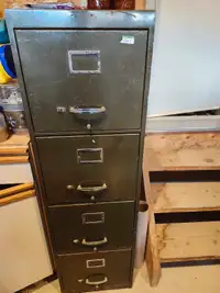 Metal 4-drawer file cabinet. 