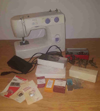 KENMORE Sewing Machine model 385 plus accessories and carry tote