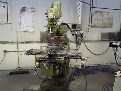 Make - First , Ram and Turret Type Vertical Milling Machine Model - LC-185VS R8 spindle Travel X 27”...