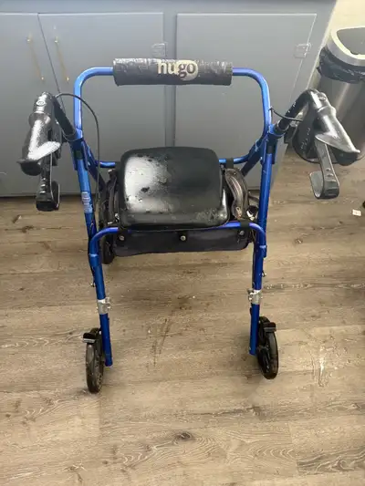 This is a Hugo Rollator Walker, designed to provide stability and support while walking. As you can...