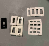 White Electric outlet cover plates 