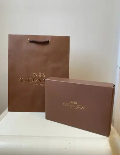Box & Shopping Bag: - ($12) COACH: 7”w x 4-3/4”h x 1-3/4”d - ($12) LeSportsac: 16”w x 12”h; Includes...