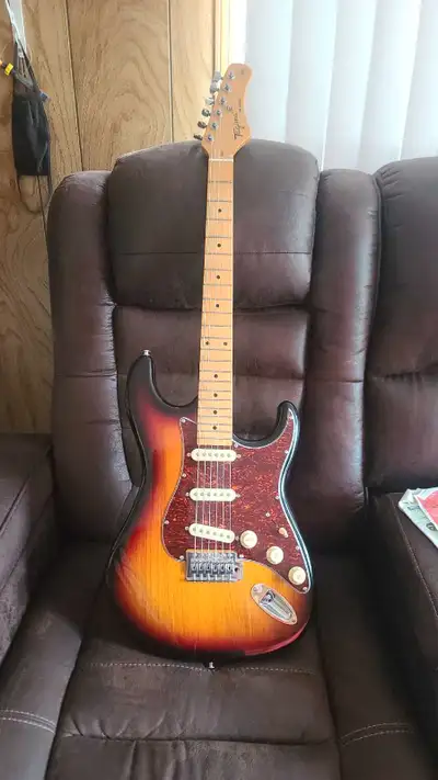 Bought this guitar brand new and hardly used it. It does have a small crack in the bottom but it doe...