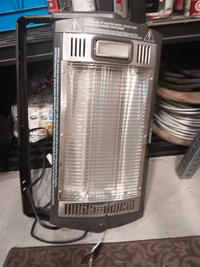 Stay warm with this efficient and portable shop heater, perfect for your workbench. This heater feat...