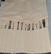 Artist assorted brushes in a pouch.