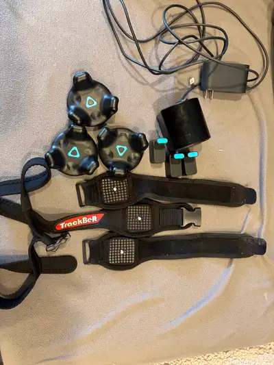 Dongle chargers not included (normal c chargers) The strap has a crack in it but is completely useab...