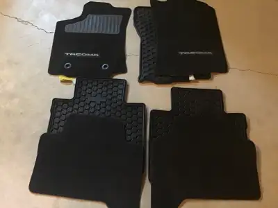 IN GREAT SHAPE BOTH RUBBER & MATERIAL ONLY DRIVERS MAT HAS FADED A TOUCH FOR $35 CANT GO WRONG