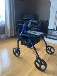 Rolling walker with seat