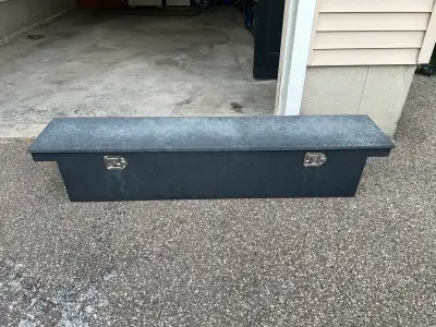 Heavy-duty black steel crossover truck toolbox in good condition. * Approximately 68” L × 14” H × 12...