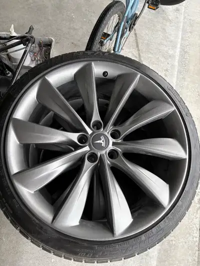 4 x 21” genuine Tesla alloy wheels. Tires…… might get you home or be good enough for a month or two,...