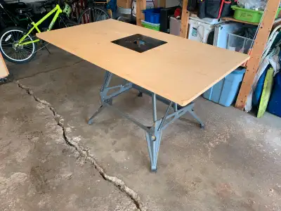 Black & Decker Workmate folding workbench. I converted it into a large, simple router table years ag...