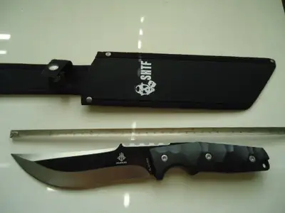 Minimizing my collection. Large outdoors camping knife, hunting knife, survival knife, fishing knife...