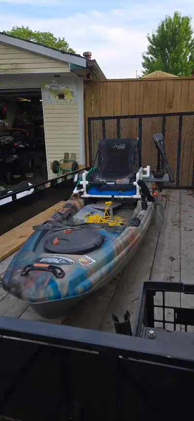 Pelican catch 120 fishing kayak. Has a minkota trolling motor with 100 amp hour lithium battery. Lig...