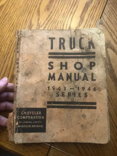 About an inch thick. Has some condition issues but an uncommon manual