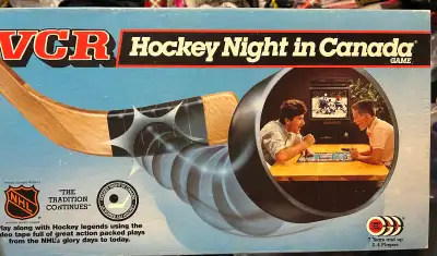 Relive the excitement of classic hockey nights with this VCR Hockey Night in Canada board game, comp...