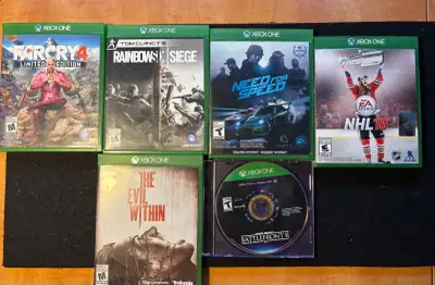 Selling a collection of used Xbox One games, including Far Cry 4 Limited Edition, Tom Clancy's Rainb...