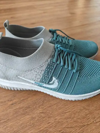 Step up your running game with these women's running shoes! Featuring a breathable knit upper and a...
