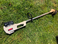 Red Green version of a Ryobi 140r cordless trimmer