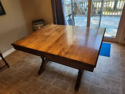 Antique solid hardwood table and 6 chairs from smoke free home. Includes 2 leaf inserts. Measures 51...