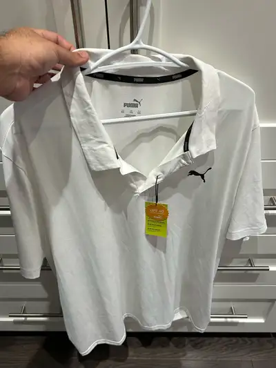 BRAND NEW WITH TAG. Size XXL men’s golf polo. Pick up Leslie & York Mills
