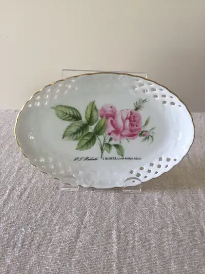 This a small trinket , ring, jewelry dish that would display nicely on your dresser. It has beautifu...
