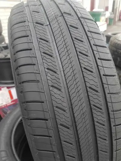 New Michelin DEFENDER 2 - Touring 215/50R17 95H XL $ 940 plus hst per set of 4 tires NEW Call The TI...