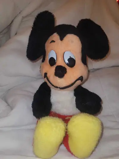 Located in Acadia S.E This is a vintage Mickey Mouse plush toy, featuring a classic design with soft...
