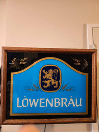 Vintage lighted woodframe Lowenbrau sign.