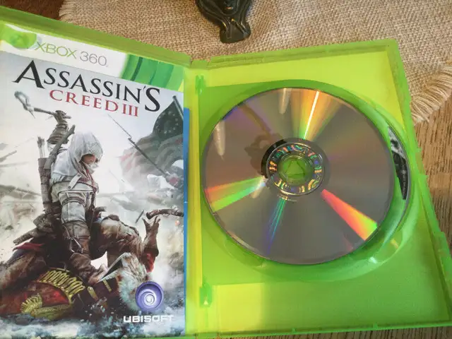 Jeu XBOX 360  Assasins. creed 111. 2 disques idee cadeau in XBOX 360 in Laval / North Shore - Image 3