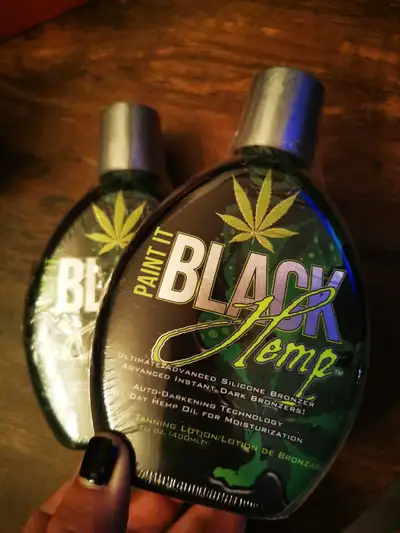 Indulge in the ultimate tanning experience with Paint It Black Hemp Tanning Lotion, featuring an adv...