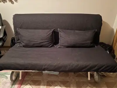 Black futon in great condition, pick up in Country Hills NW
