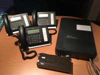 Toshiba Strata phone system with 3 phones and power supply 