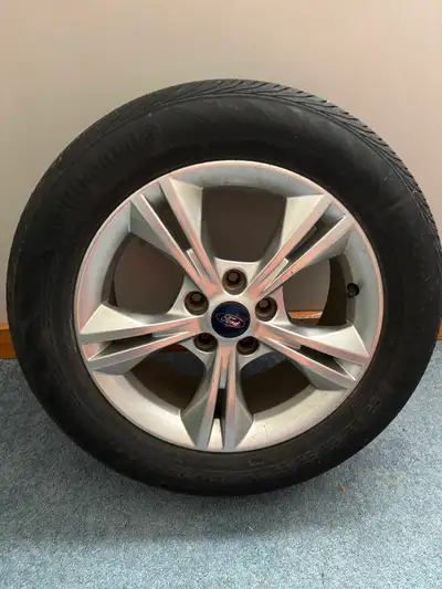 4 Summer Tires on Ford factory rims off a Ford Focus - 215/55R16 $375 FOR 4 TIRES AND RIMS