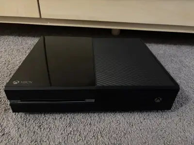 Xbox One with no cords or controller. System only. Tested and does work.