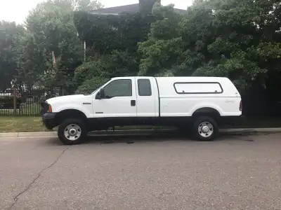 F250 XL 4x4 super duty super cab, 6 litre turbo diesel, never winter driven, selling safety 18000.00...