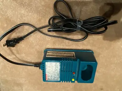 Makita 9.6V charger and battery for cordless tools, View more
