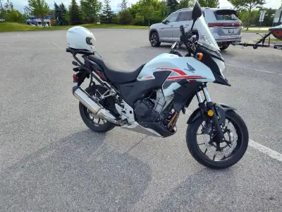Adventure style Honda Motorcycle Includes: -centre stand for easy maintenance. -tall wind screen+ or...