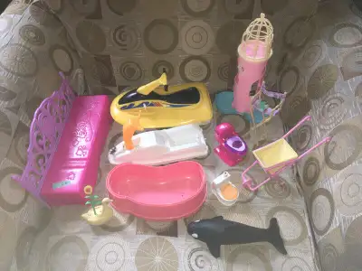 Assorted Barbie furniture priced as listed Cat/bird tower $5 Wheelbarrow $2 Duck planter $2 Director...