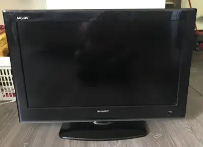 32" Sharp LCD TV - No Remote but has buttons on the side, View more