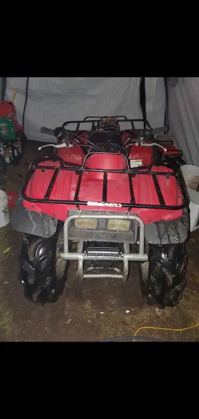 2 wheel drive. Runs and drives pretty decent and also has reverse. And lights. Has upgraded mudzilla...