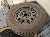 P275/65/18 Bridgestone Blizzak winter tires on F150 wheels