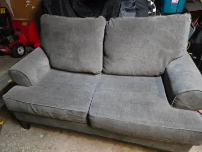 Grey loveseat in excellent condition, View more
