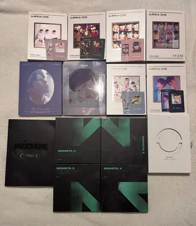 Multiple kpop albums for sale including: *the Wanna One Undivided albums all include minor damages f...